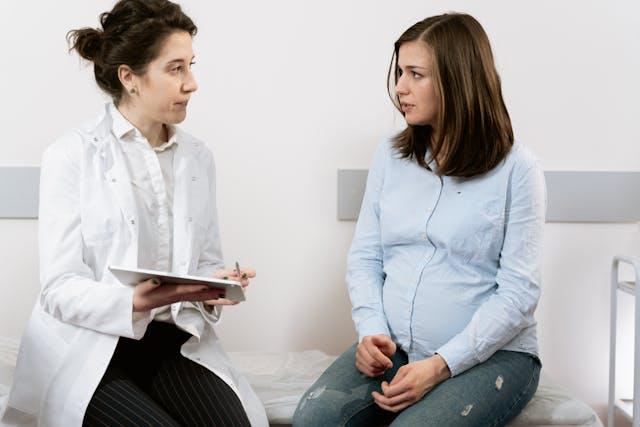 A doctor talking to a patient