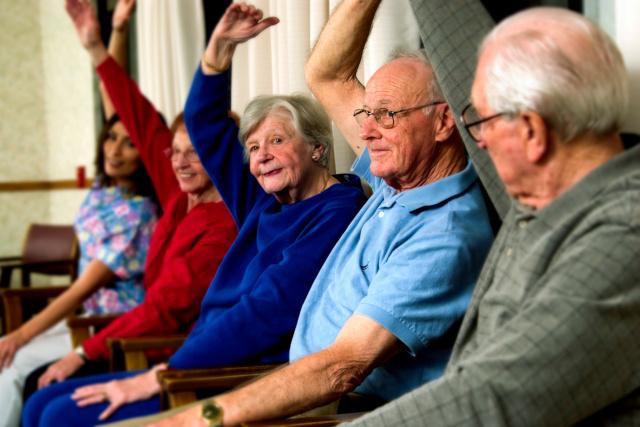 Group of elderly people exercising